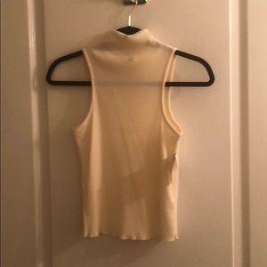 Sleeveless mockneck ribbed top